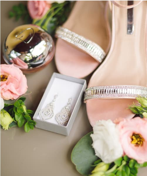Lily's accessories featuring her earrings and shoes.